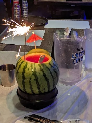 Watermelon soju lit with a sparkler at Dae Bak